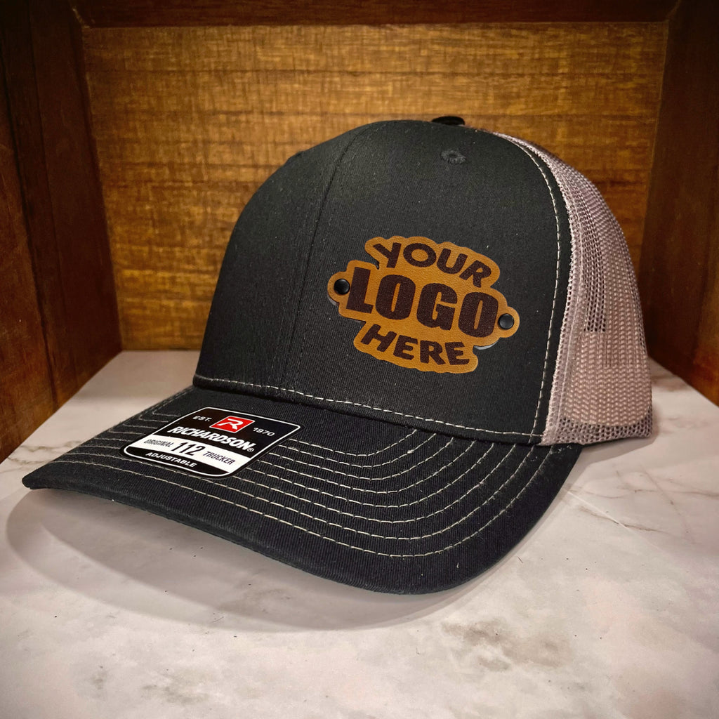 black and charcoal Richardson 112 hat